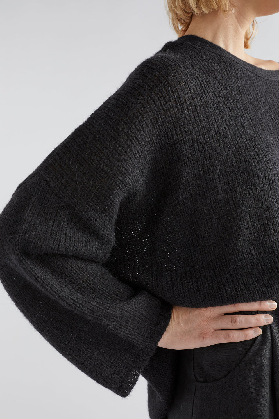Anga Relaxed Box Fit Alpaca Yarn Knit Sweater Model Front Tucked Jess detail | Black