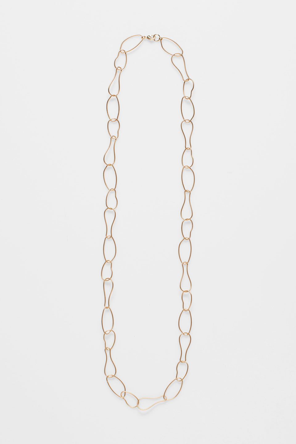 Niika Fine Organic Shaped Chain Coated Metal Necklace Flat | GOLD
