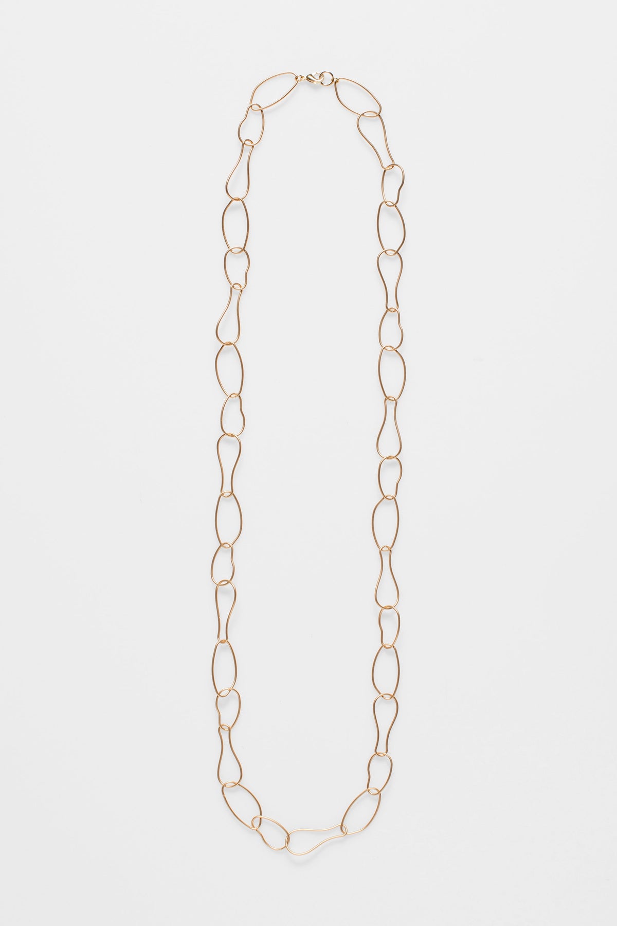 Niika Fine Organic Shaped Chain Coated Metal Necklace Flat | GOLD