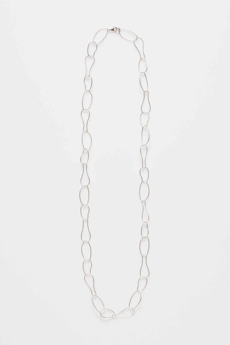 Niika Fine Organic Shaped Chain Coated Metal Necklace flat | SILVER