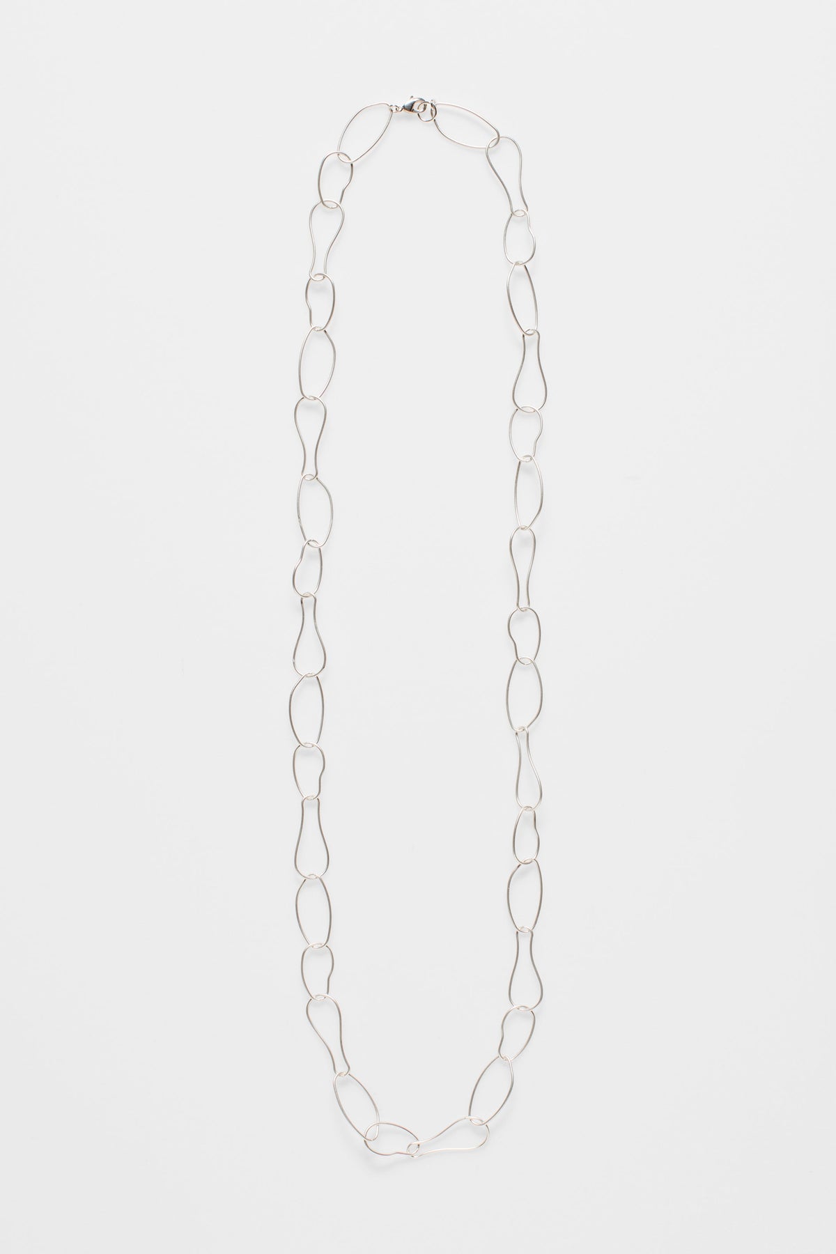 Niika Fine Organic Shaped Chain Coated Metal Necklace flat | SILVER