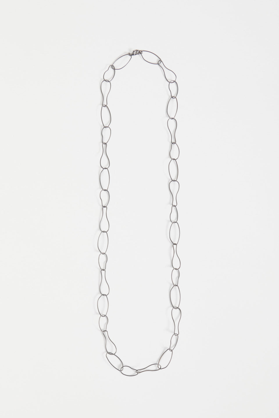 Niika Fine Organic Shaped Chain Coated Metal Necklace Flat | GUNMETAL