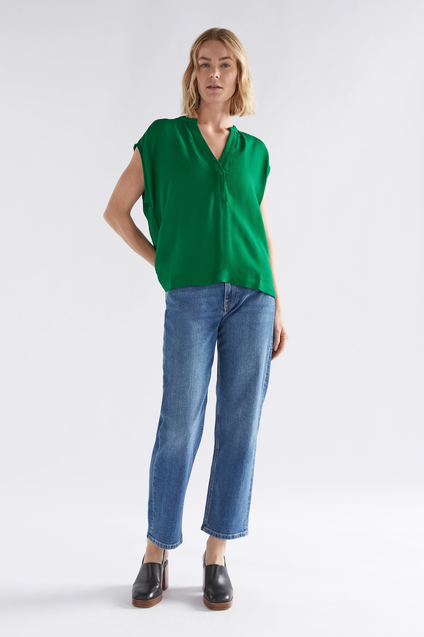 Parq Waffle Crepe V-Neck Top with Cap Sleeve Model Front Full Body | JEWEL GREEN