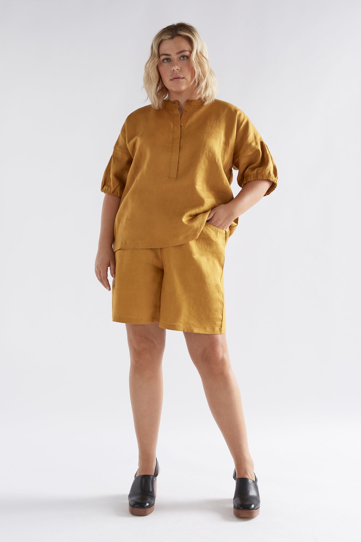 Strom Linen Puff Sleeve Collarless Shirt Model Front Curve | HONEY GOLD