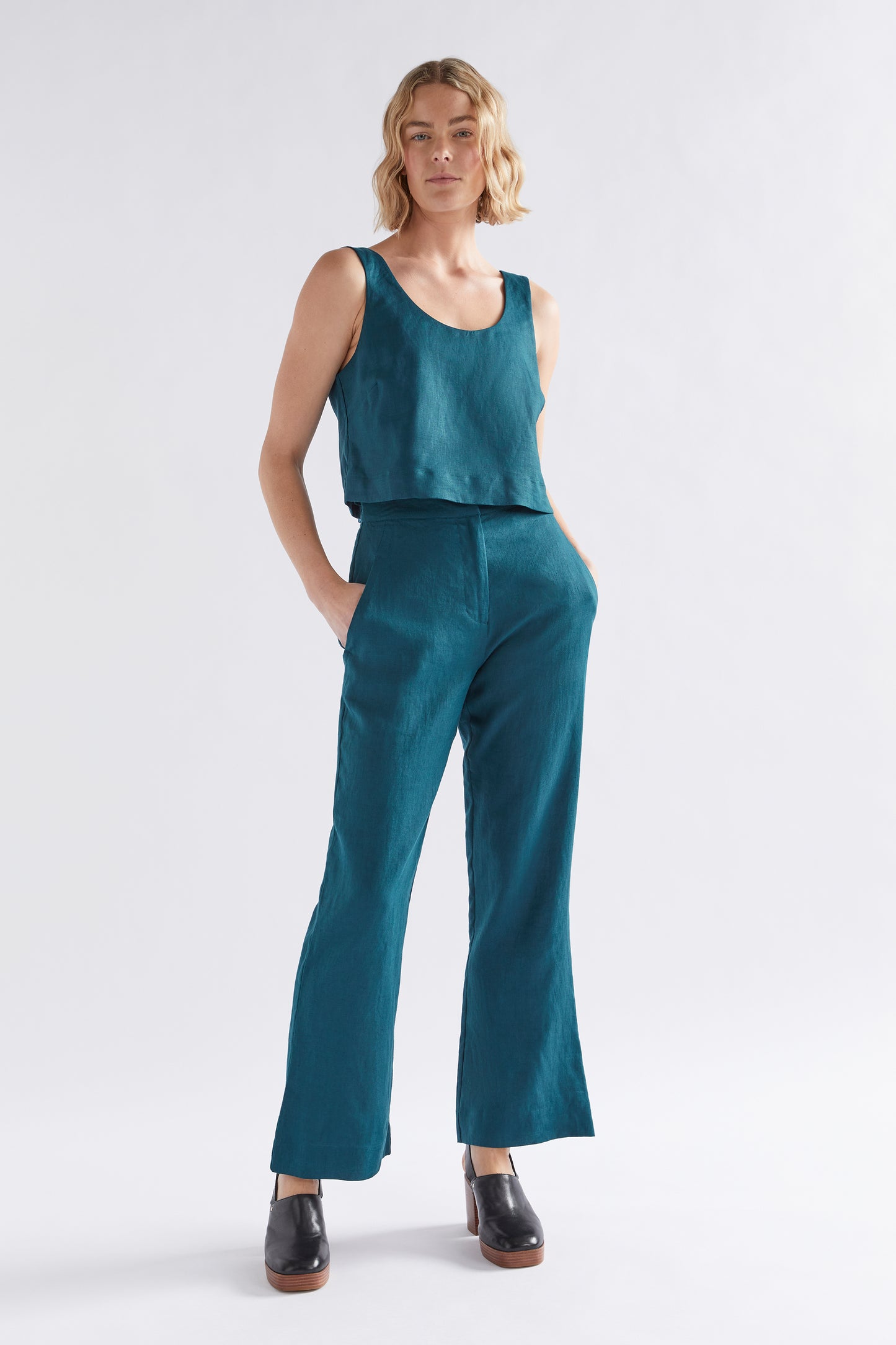 Stilla Linen Boot Cut High Rise Pant model front with Strom Tank | PEACOCK