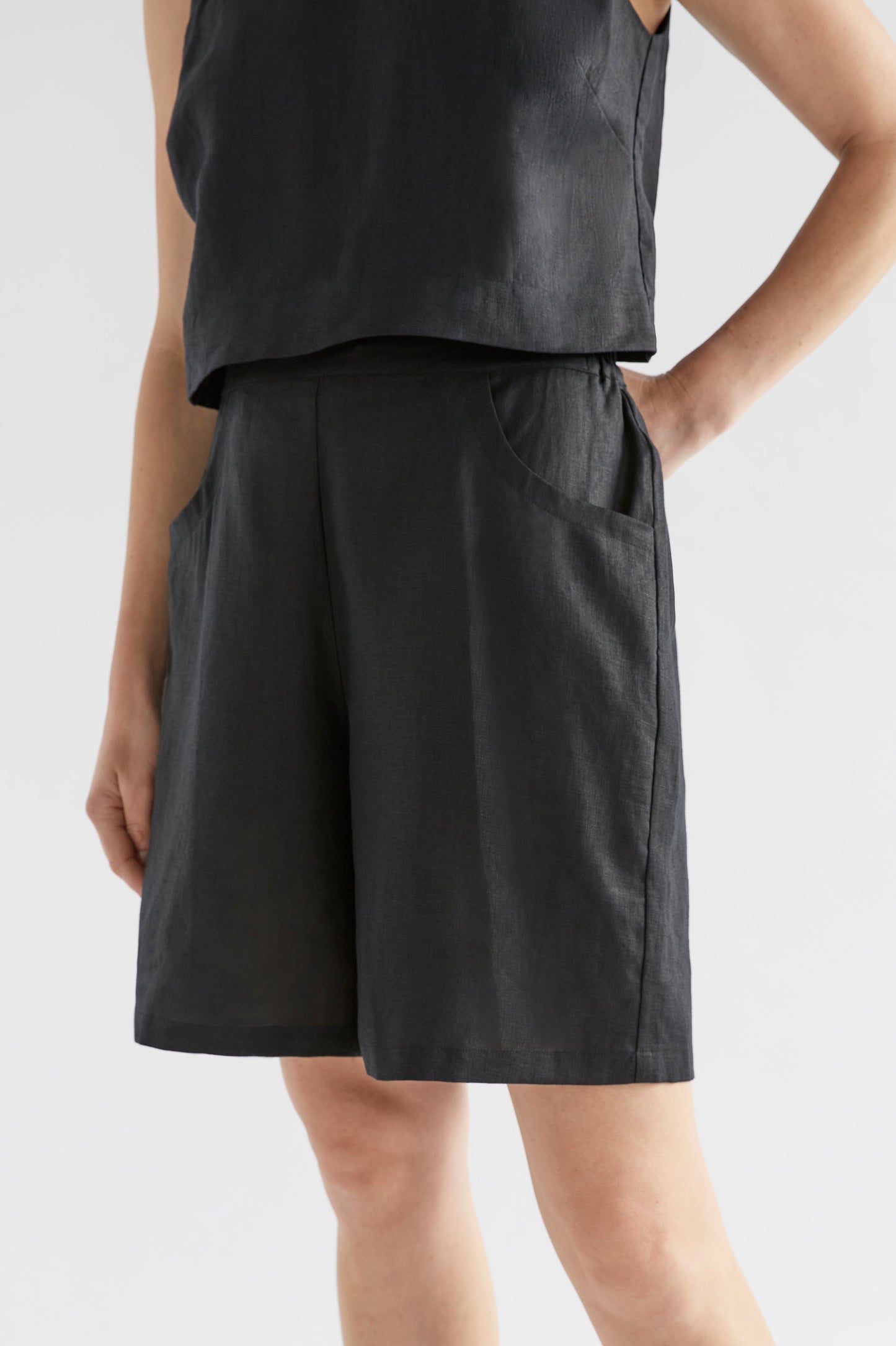 Strom Mid Length Linen Short Model Front crop | BLACK