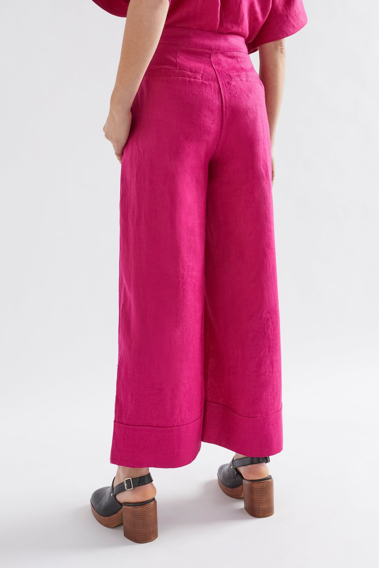 Anneli Light Wide Leg Linen Pant Model Angled Back | BRIGHT PINK