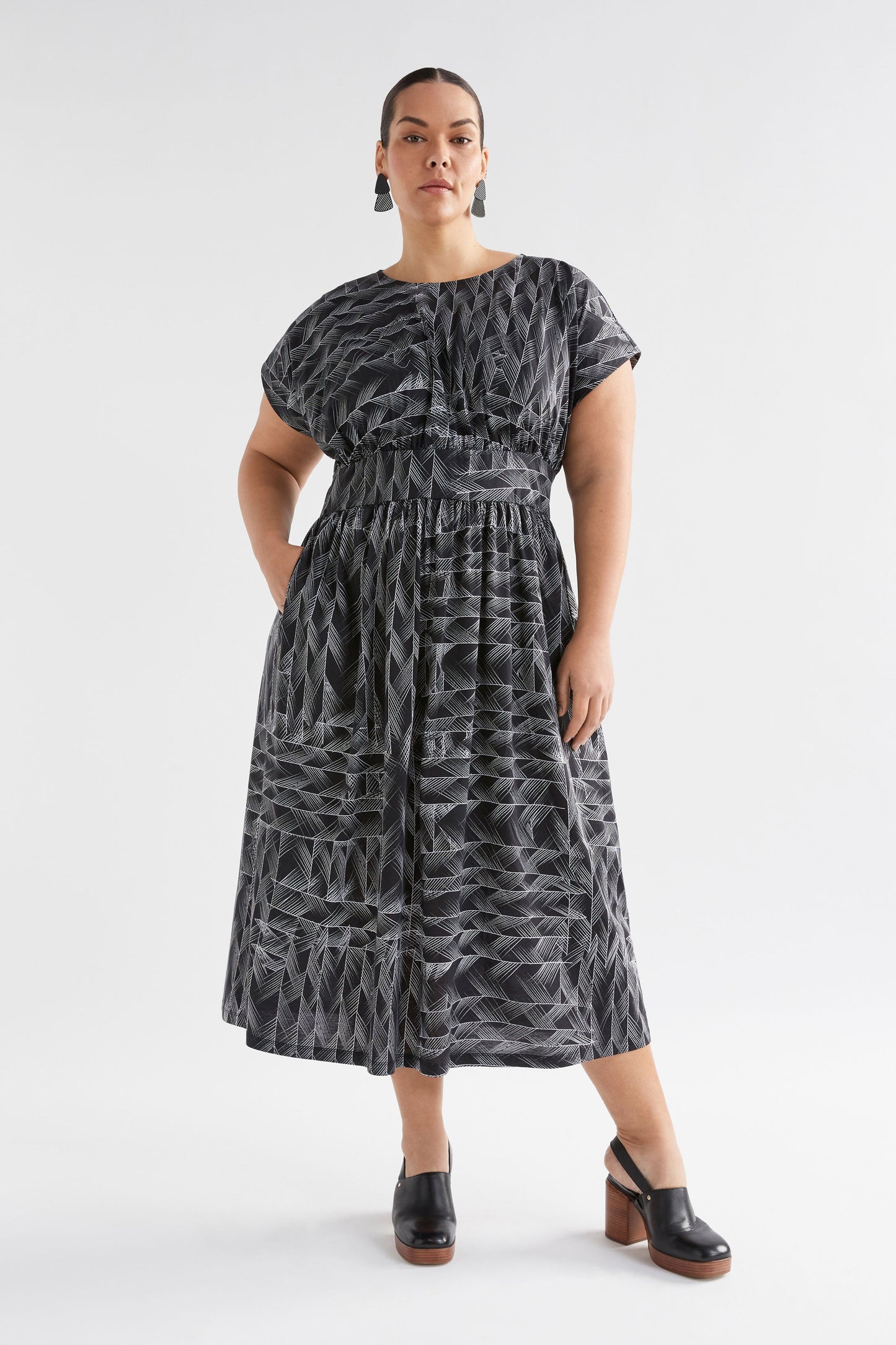 Jager Cap Sleeve Waisted Cotton Jersey Print Dress Model Front Full Body Curve | BLACK LINE PRINT