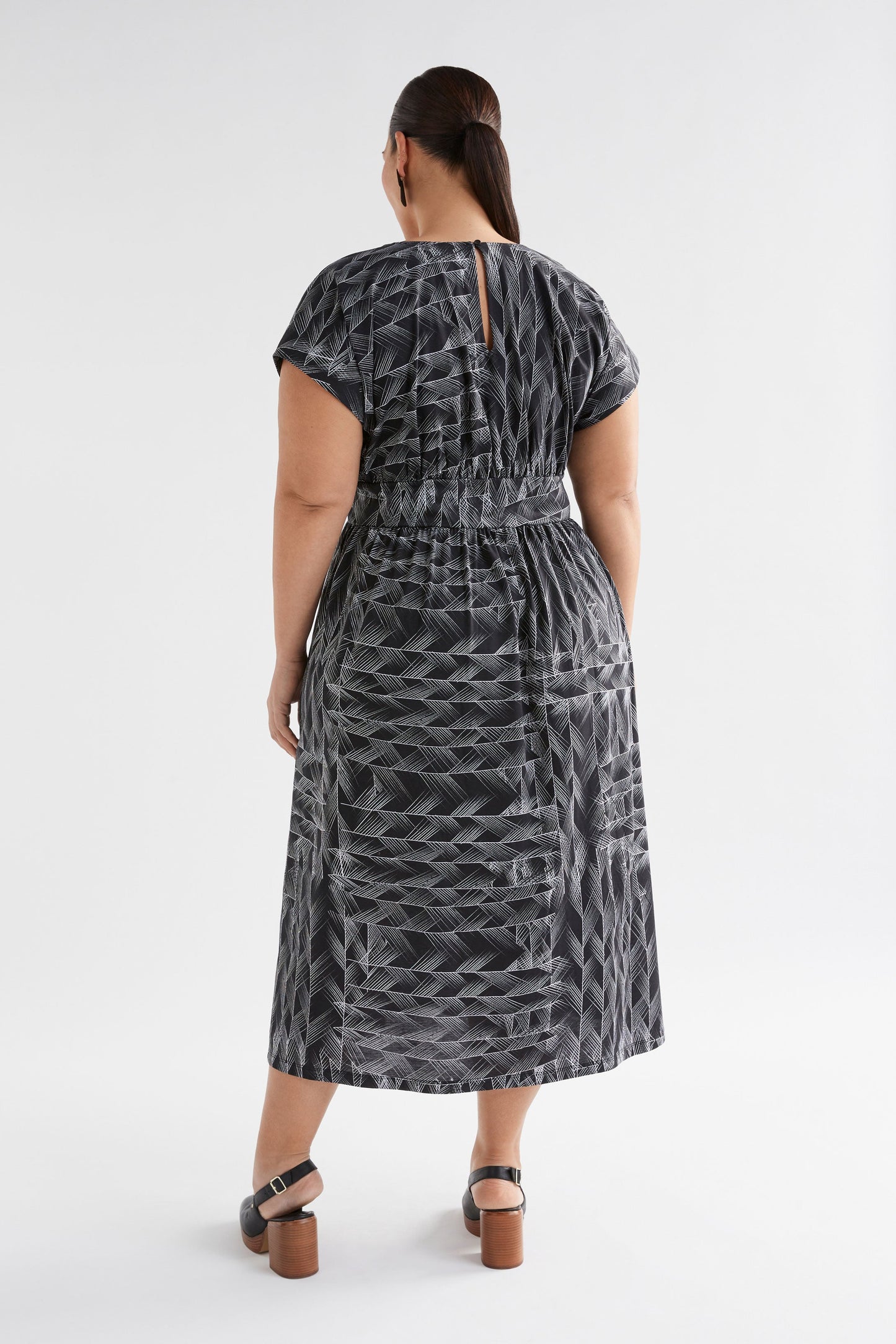 Jager Cap Sleeve Waisted Cotton Jersey Print Dress Model back Full Body | BLACK LINE PRINT