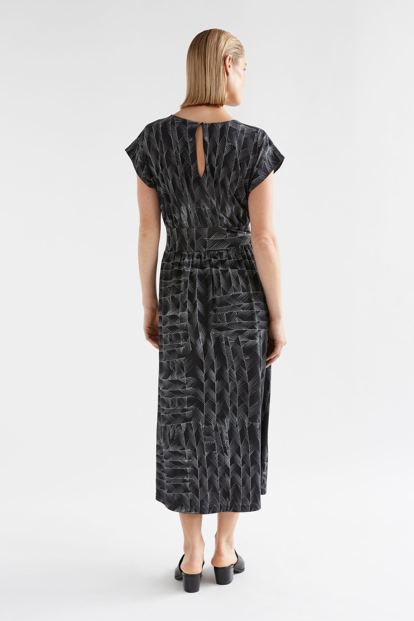 Jager Cap Sleeve Waisted Cotton Jersey Print Dress Model Back Full Body | BLACK LINE PRINT