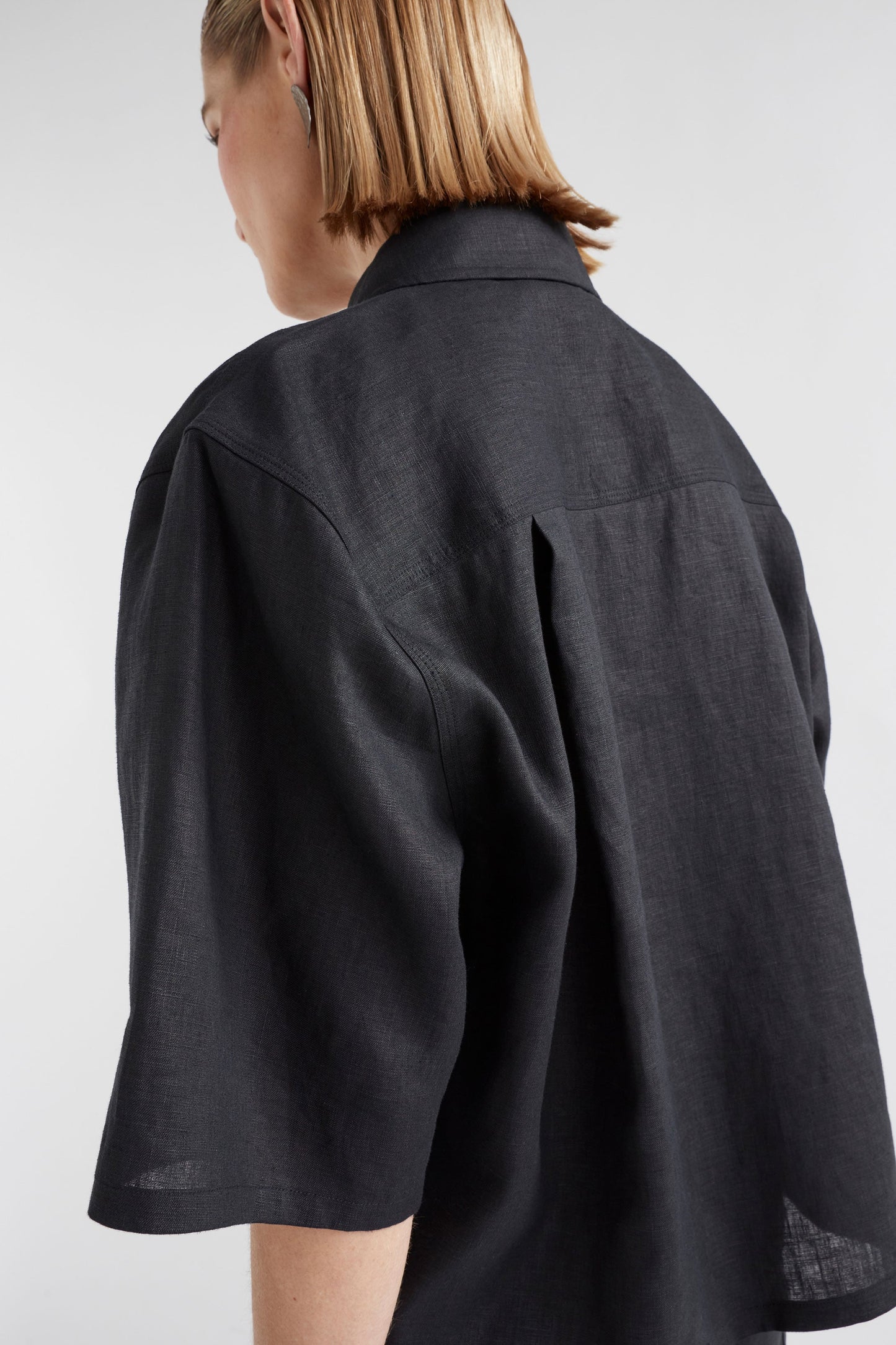 Nayte Boxy Relaxed Wide Short Sleeve Linen Shirt Model Back Detail | BLACK