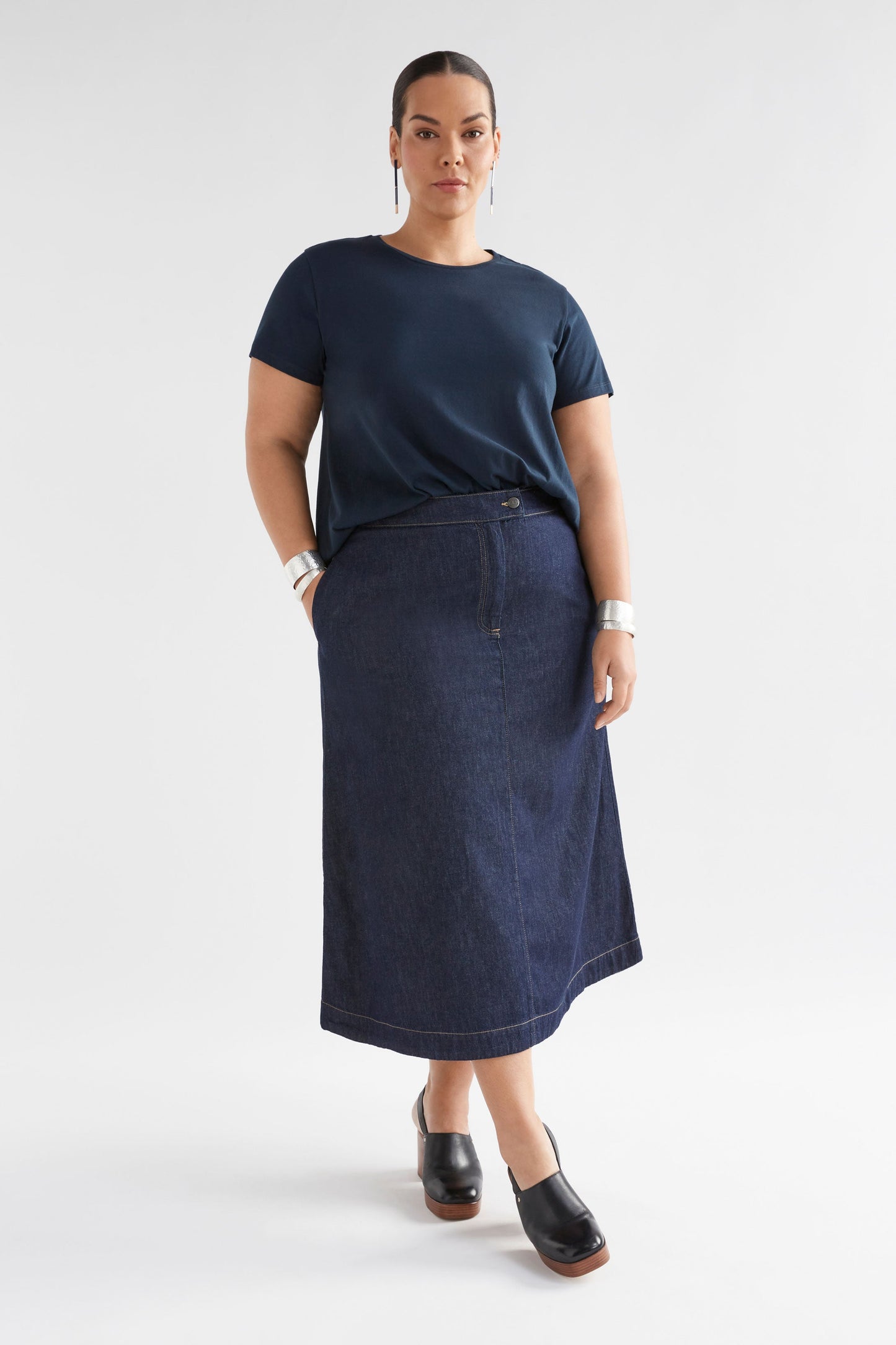 Denym A-line Midi Skirt Model Angled Front Full Body Curve  | AUTHENTIC BLUE WASH