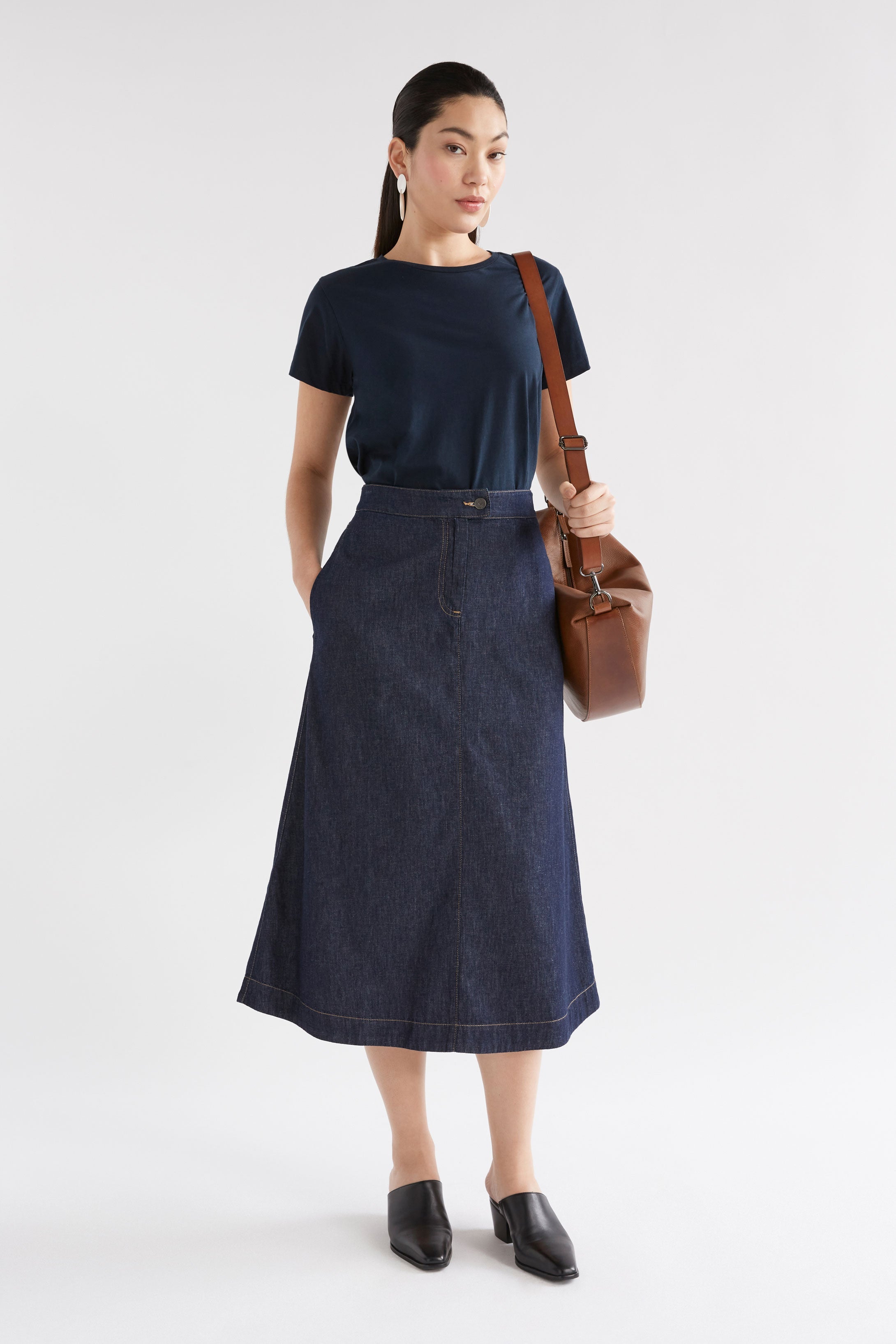 Denym A-line Midi Skirt Model Angled Front Full Body | AUTHENTIC BLUE WASH