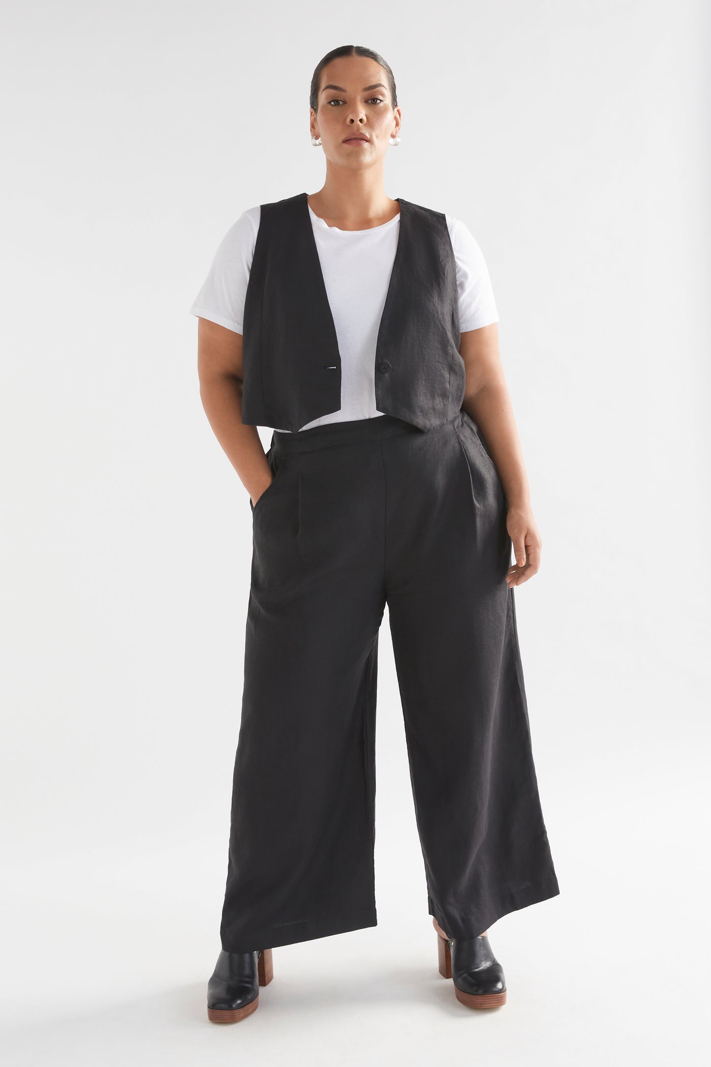 Ilona Linen Cropped Button-up Vest Model with Tee Front curve full body | BLACK