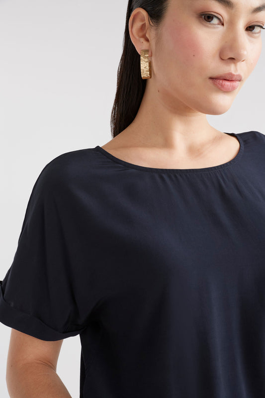 Eryn Silky-Feel Rolled Sleeve Short Sleeve Top Model Detail | SPACE BLUE