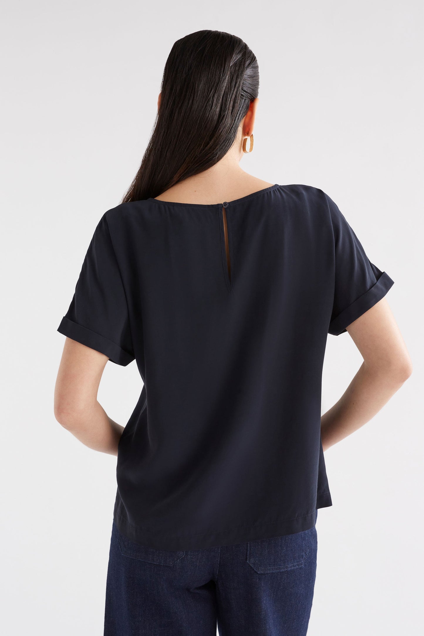 Eryn Silky-Feel Rolled Sleeve Short Sleeve Top Model Back | SPACE BLUE