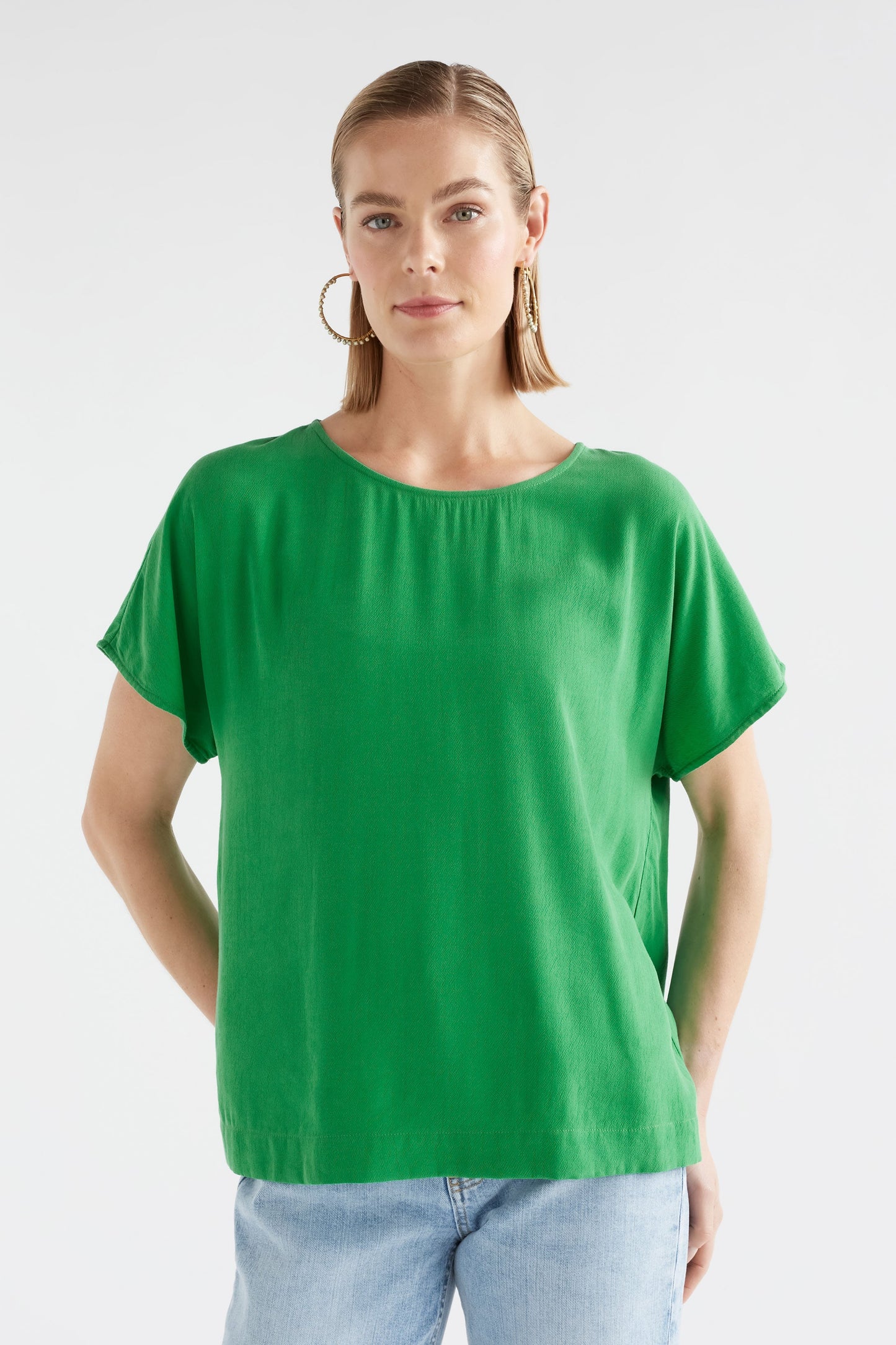 Olyck Round Neck Cap Sleeve Shell Top Model Front Crop  | VINE GREEN