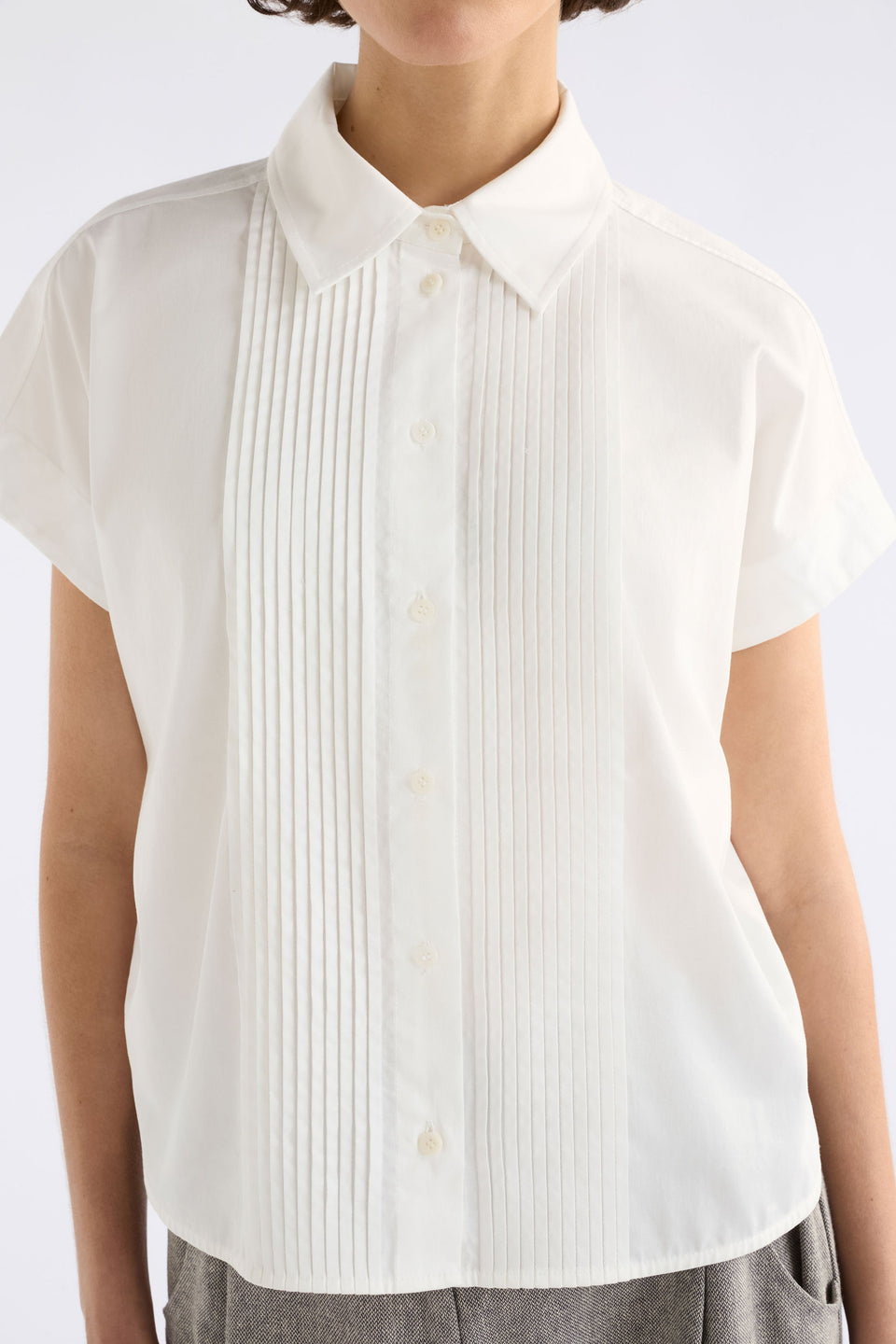 Apres Short Cap Sleeve Organic Cotton Short with Pleat Detail Model Front Crop | WHITE