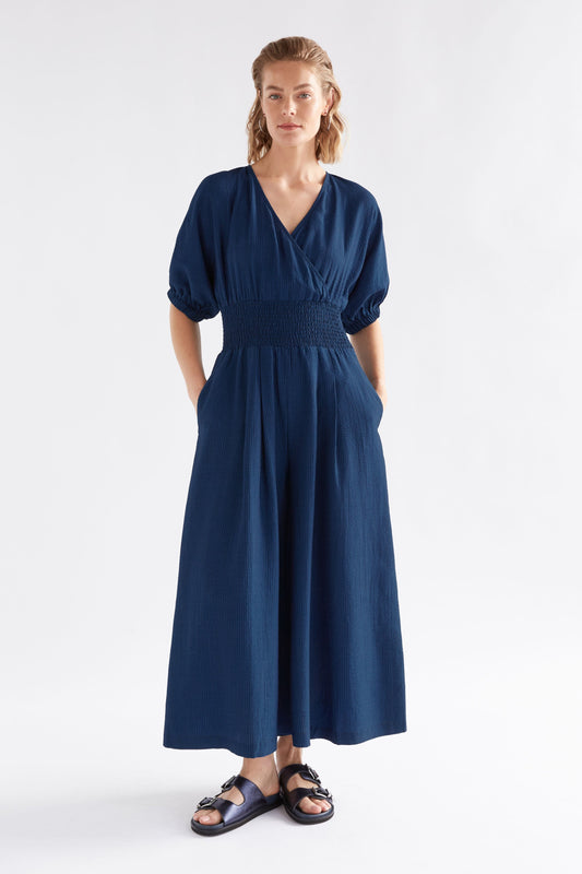 Stolt Seersucker Short Puff Sleeve Wide Leg Shirred Waist V-neck Jumpsuit ELK Model front | MID WASH