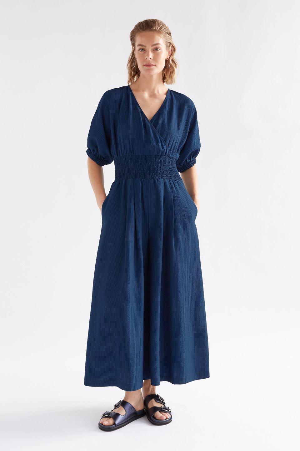 Stolt Seersucker Short Puff Sleeve Wide Leg Shirred Waist V-neck Jumpsuit ELK Model front | MID WASH