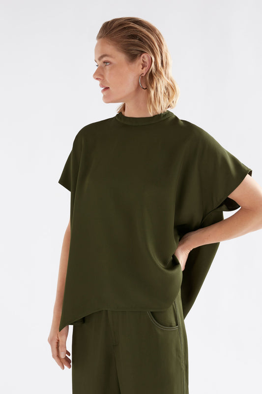 Hullu Relaxed Short Sleeve High Neck Top with Handkerchief Hem Model Front crop | BRIGHT OLIVE