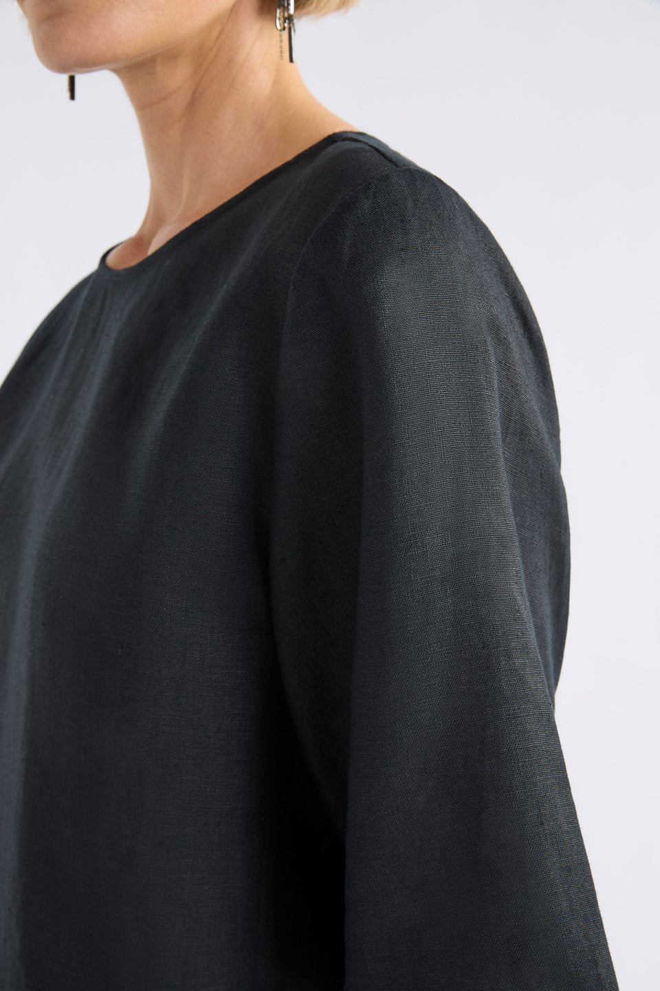 Llinen Boxy Elbow Length Sleeve Round Neck Linen Cropped Top Model Side Detail | BLACK