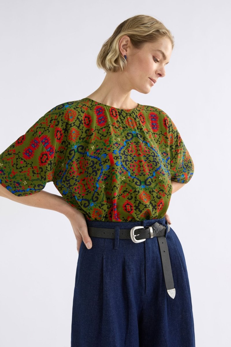 Dela Geometric Round Neck Tee Top Olive Print Model front tucked | RENDA PRINT