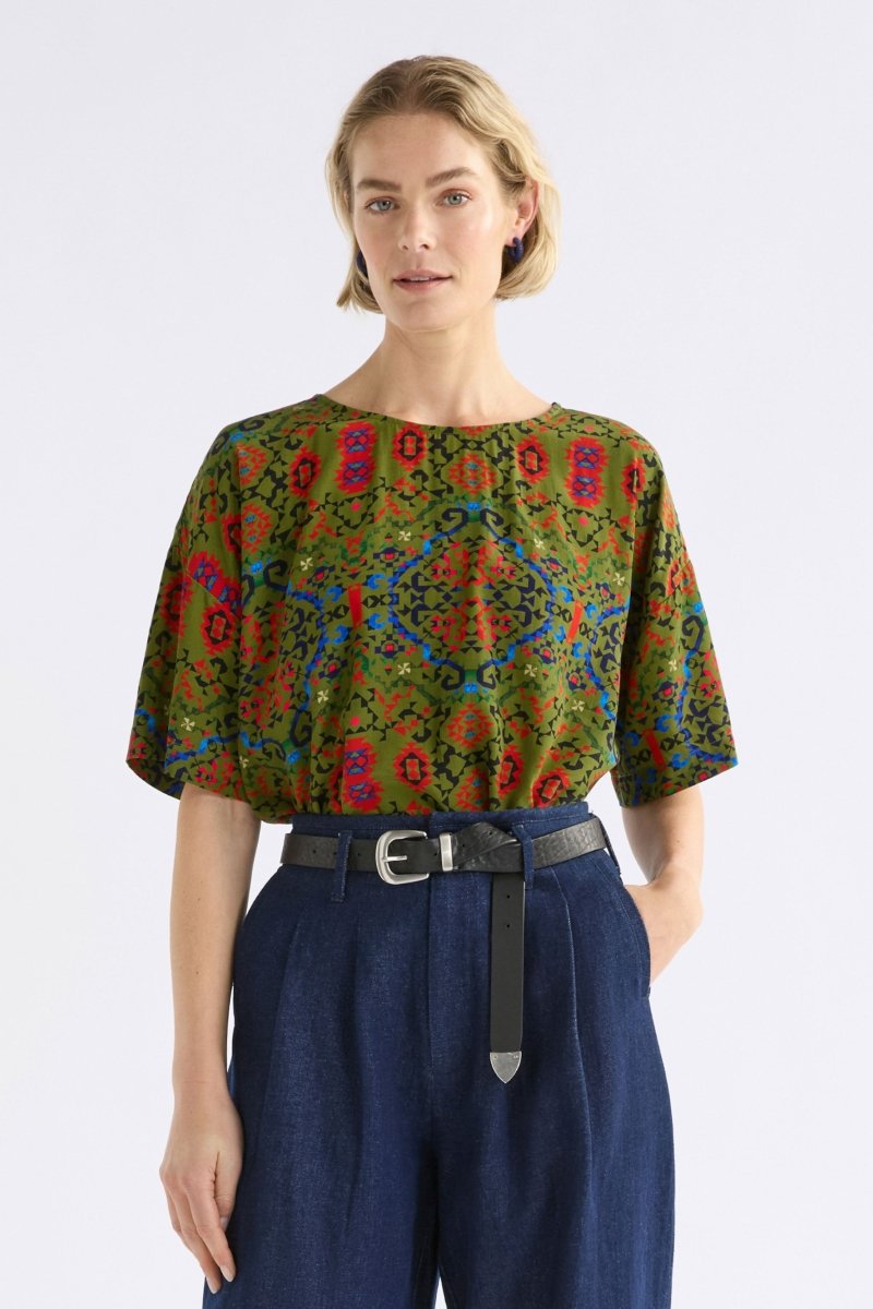 Dela Geometric Round Neck Tee Top Olive Print Model front tucked 2 | RENDA PRINT