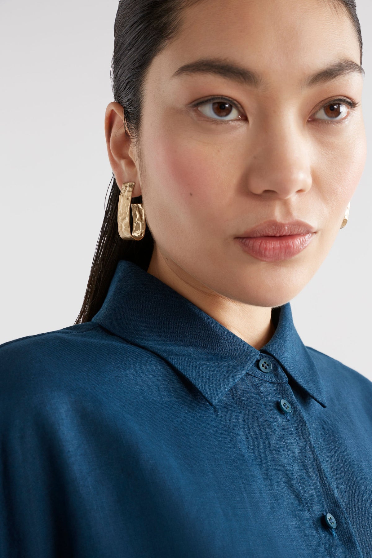 Gild Large Hammered Texture Metal Hoop Earring Model Crop | GOLD