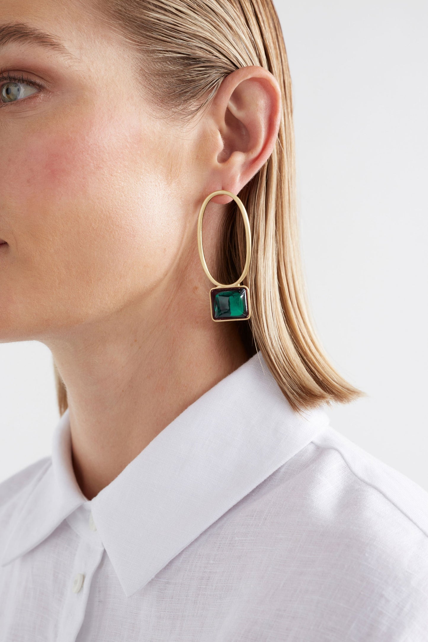 Stal Brushed Metal Drop Stud Earring with Coloured Glass Jewel Detail Model Crop | EMERALD