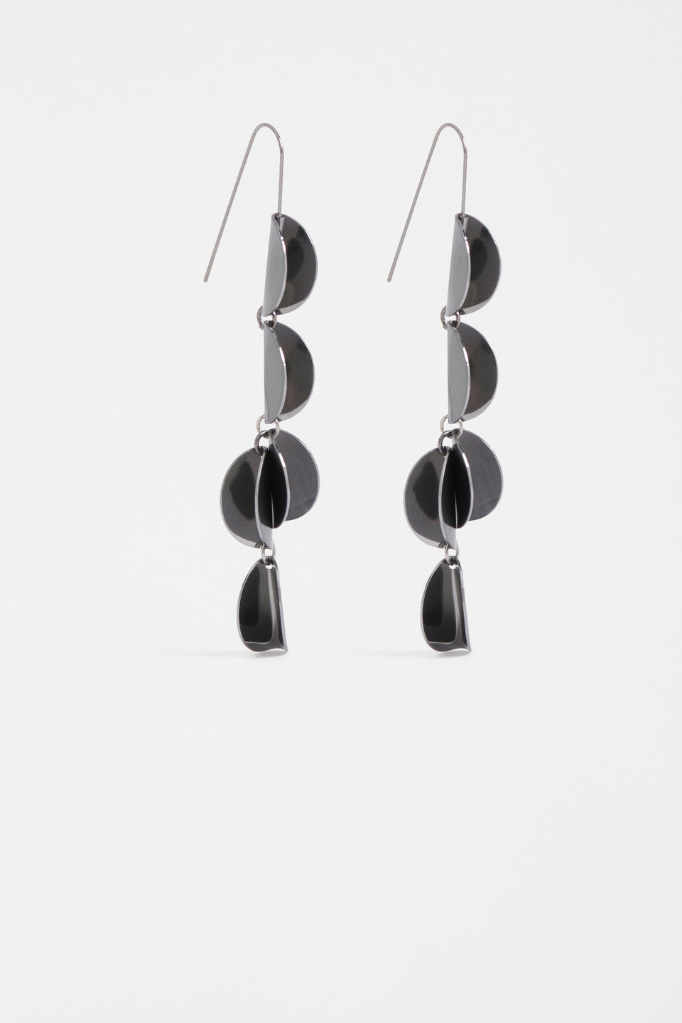 The Fossen Drop Earring features folded metal discs in a vertical row with a brushed finish ELK | GUNMETAL