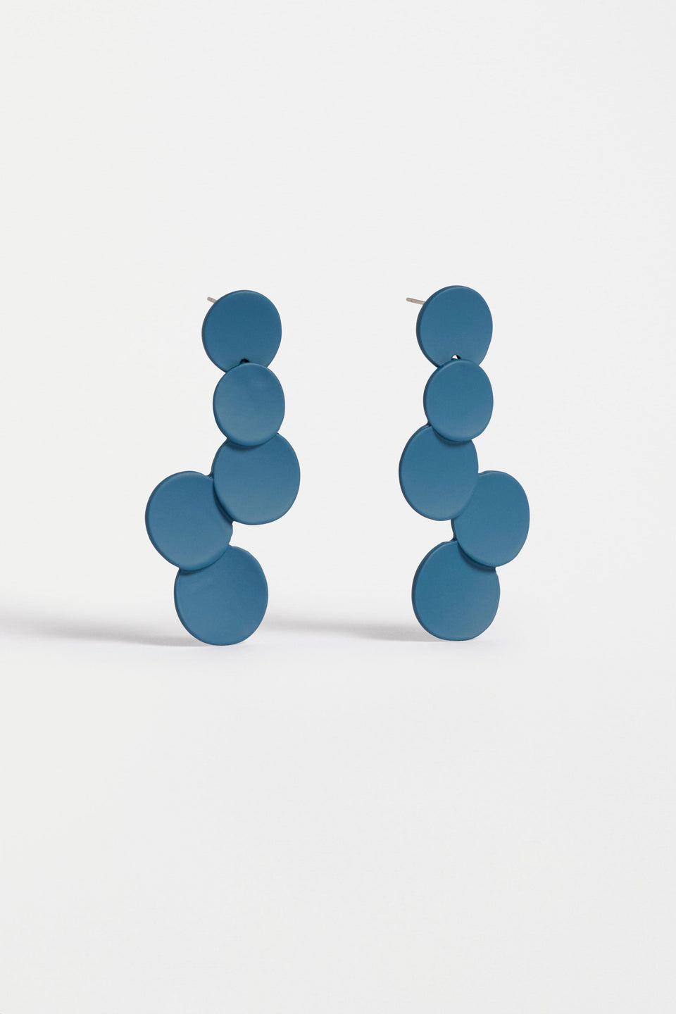 The Tallke Drop Earring features overlapping sculptural circles in an elongated form with a matte rubberised finish for playful impact ELK | SLATE BLUE