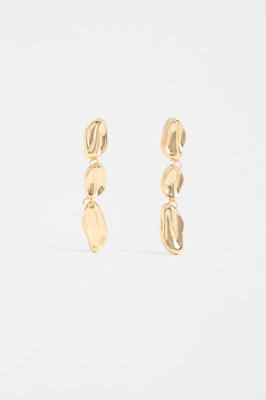 The Delaa Drop Earring features three sculptural rounded shapes linked for soft, organic movement ELK | GOLD