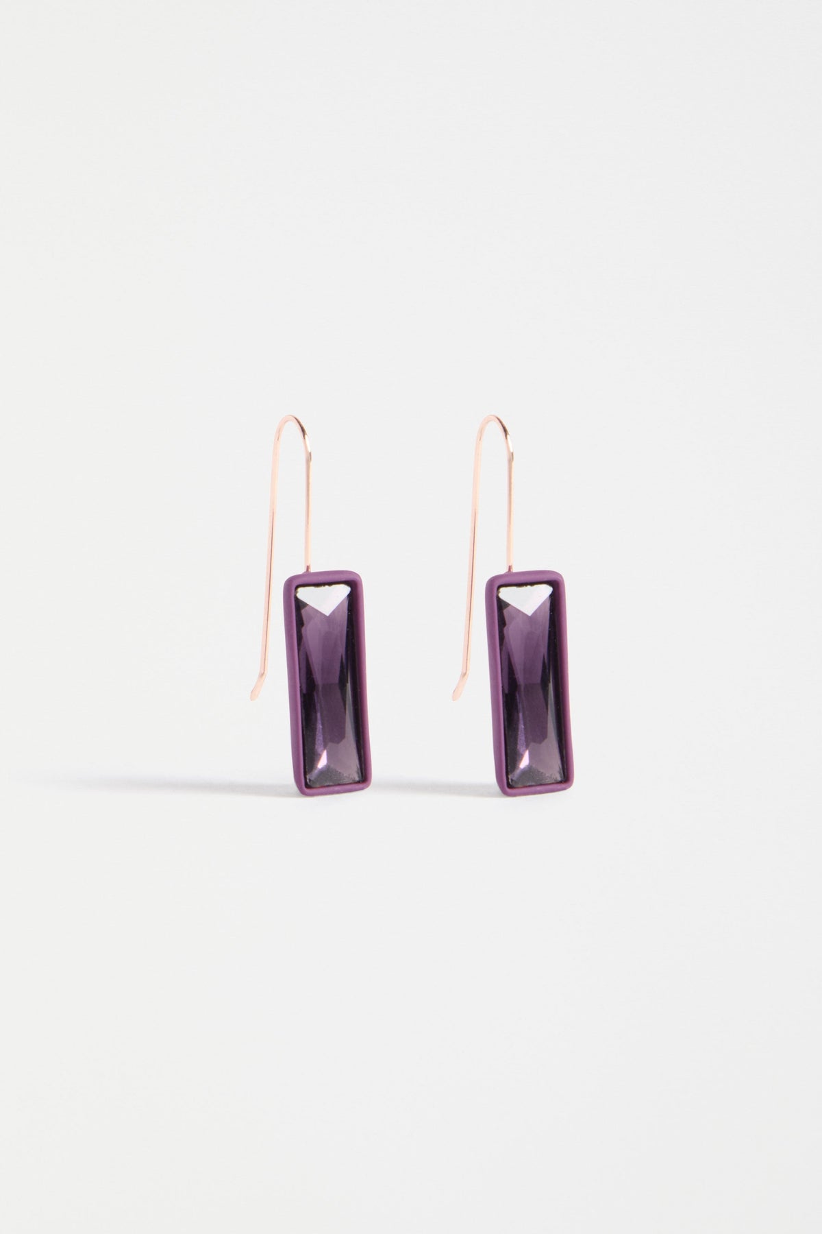 The Jule Small Hook Earring features a single glass stone with tonal rubberised casing and a simple hook, offering lightweight refinement | PURPLE