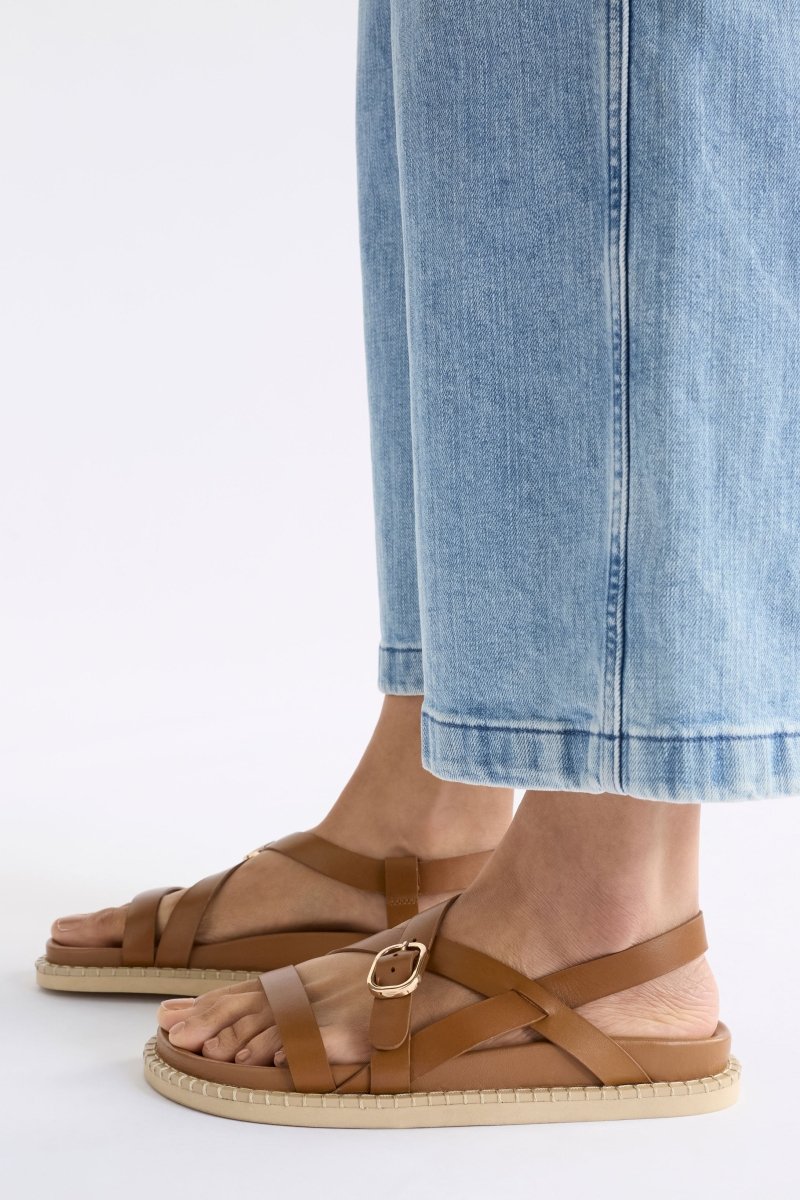 The Kilsa Sandal features minimal tan leather straps, moulded footbed and EVA sole in a handcrafted design ELK | TAN