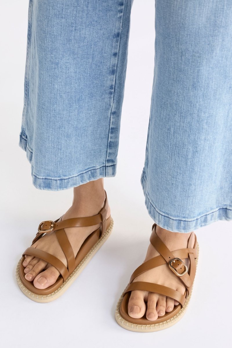 The Kilsa Sandal features minimal tan leather straps, moulded footbed and EVA sole in a handcrafted design ELK | TAN