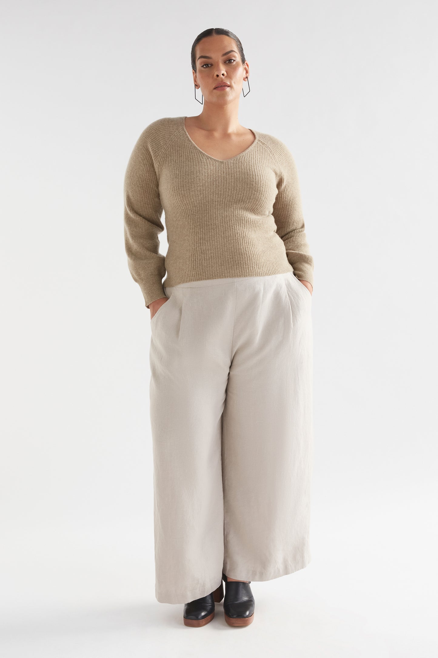 Lysa V-Neck Puff Sleeve Rib Wool Knit Sweater Model Front full body curve | SAND