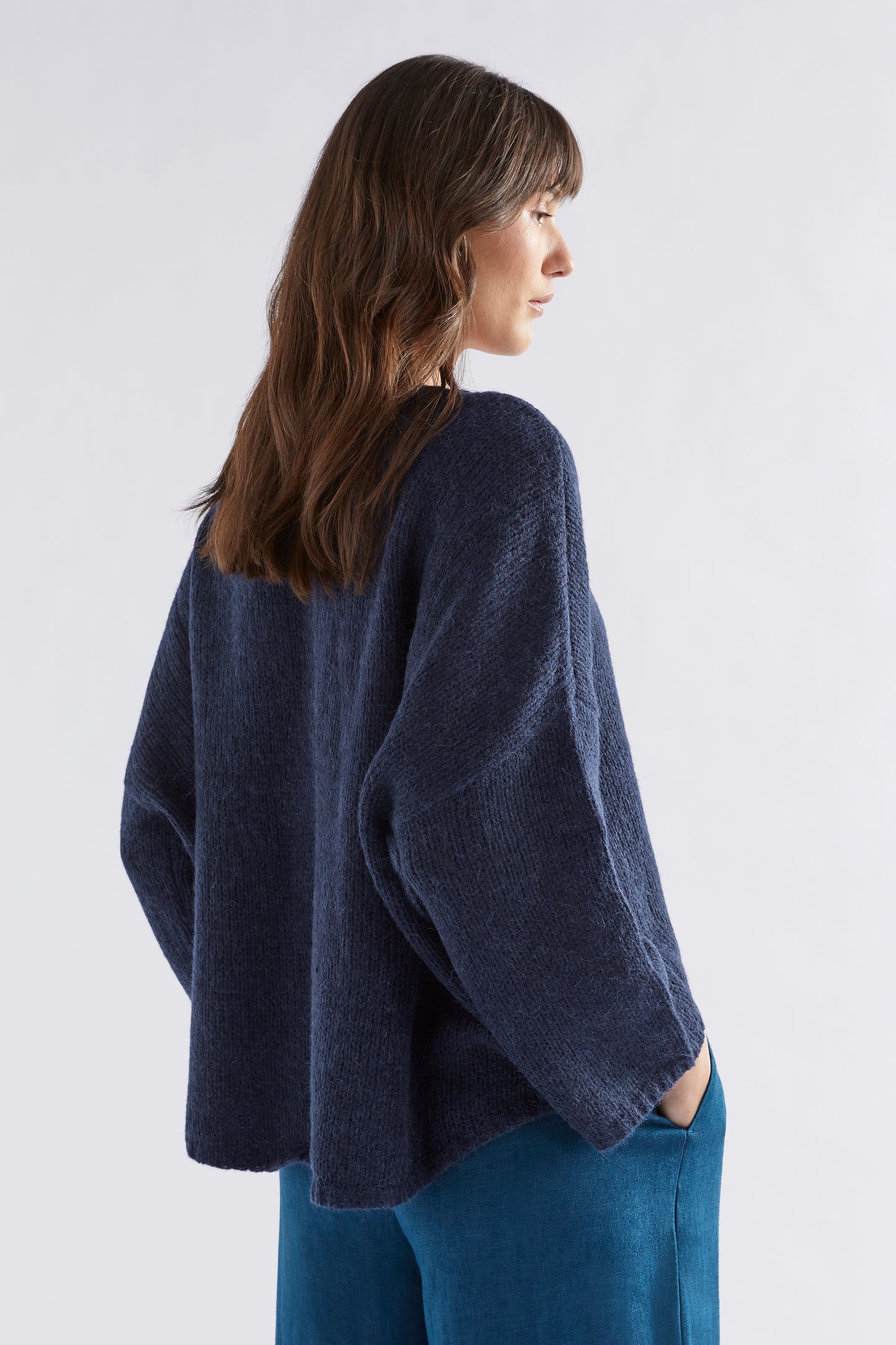 Agna Merino and Alpaca Wool Sweater Model Angled Back | STEEL BLUE
