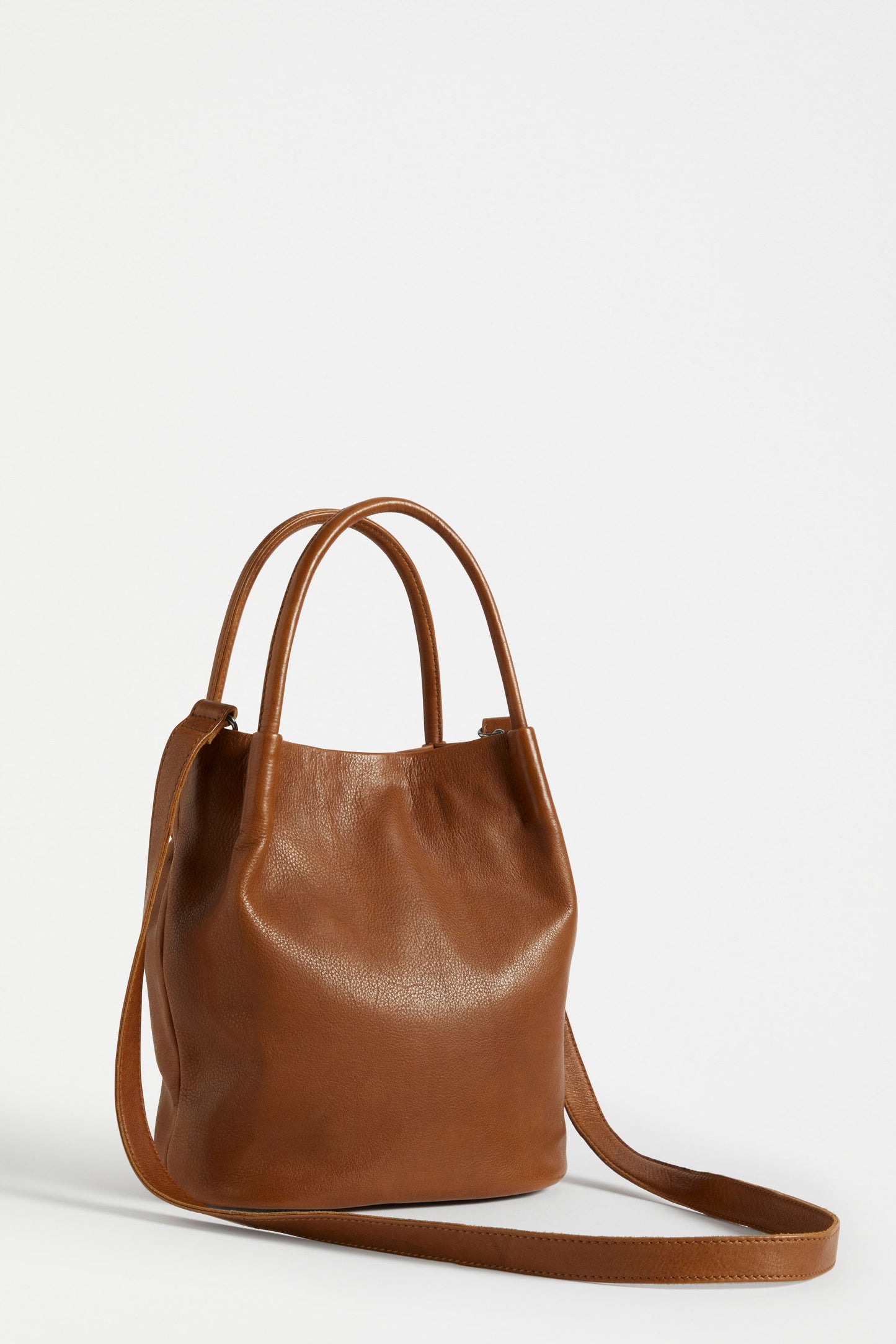 Mini Remnant Leather Orsa Bucket Bag with Fixed Handle and Detachable Strap Front | TAN