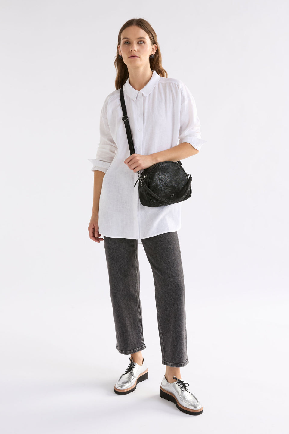 Kjeld Rounded Small Leather Crossbody Bag with Detachable handle and Strap back Model full body | BLACK SHIMMER