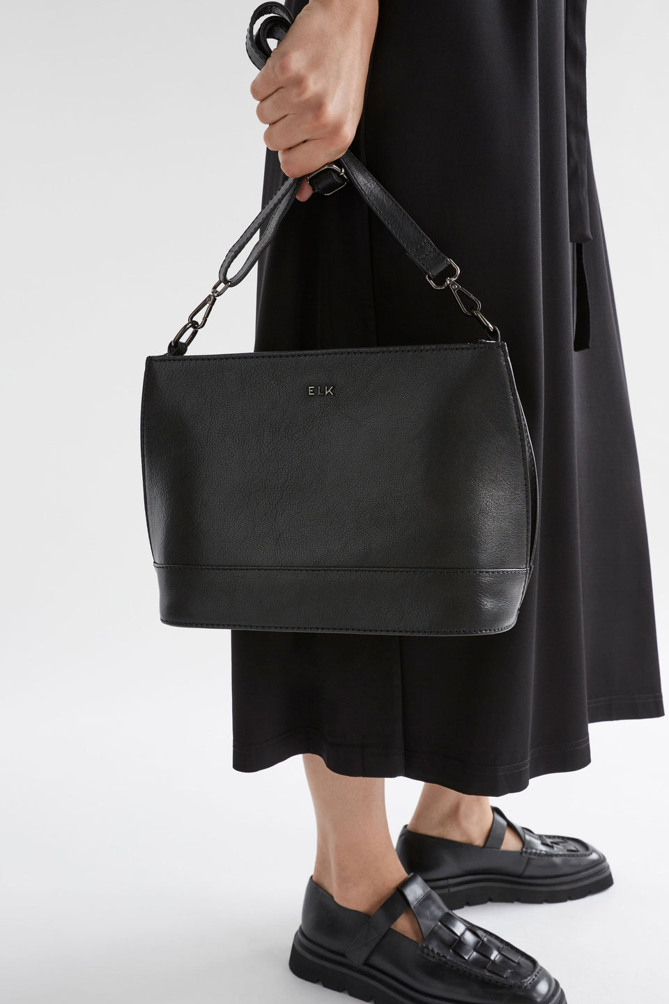 Fika Mid Sized Leather Zip up Handbag Model | BLACK