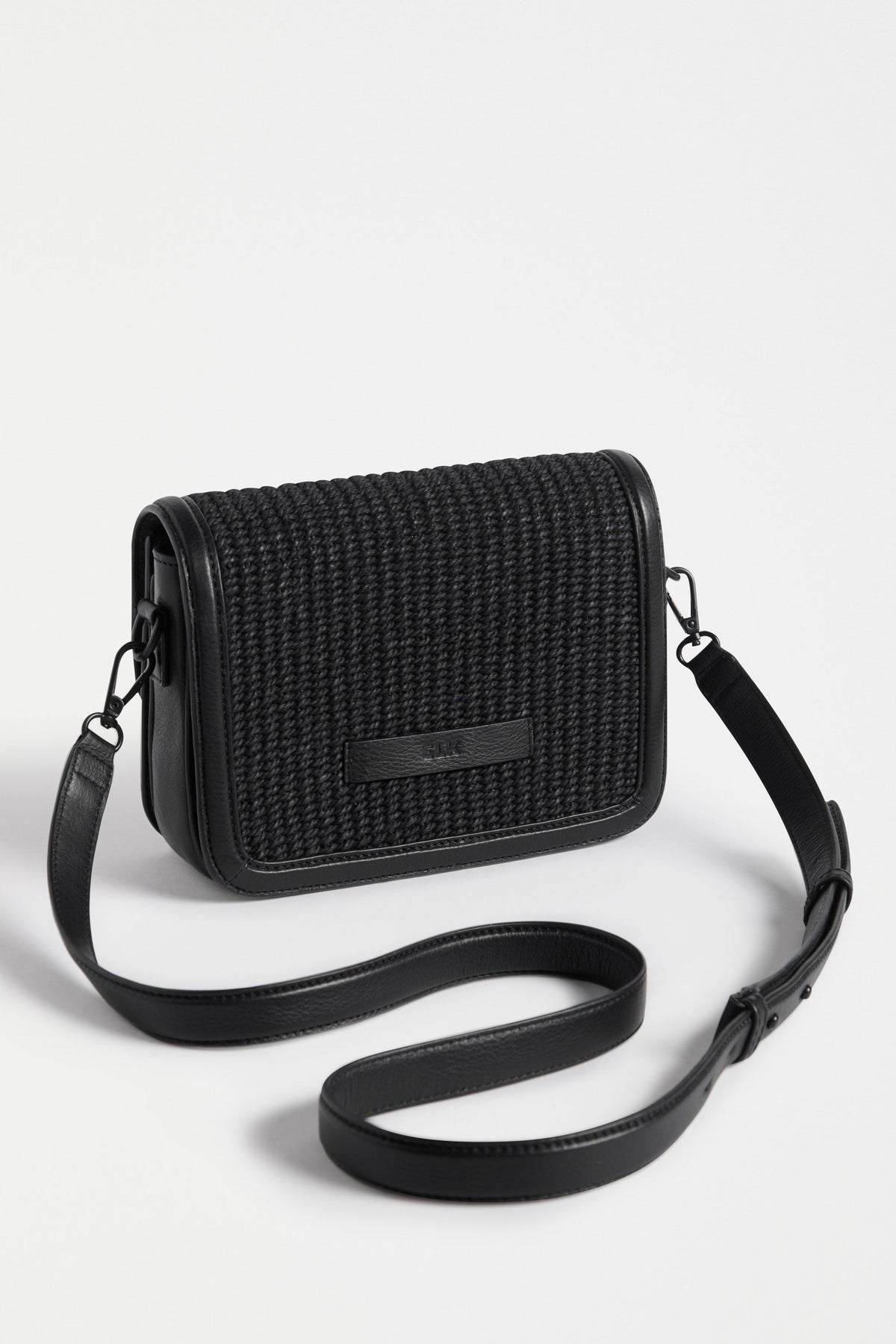 Ralffa Crossbody Flat Lay with strap and fabric detail | BLACK