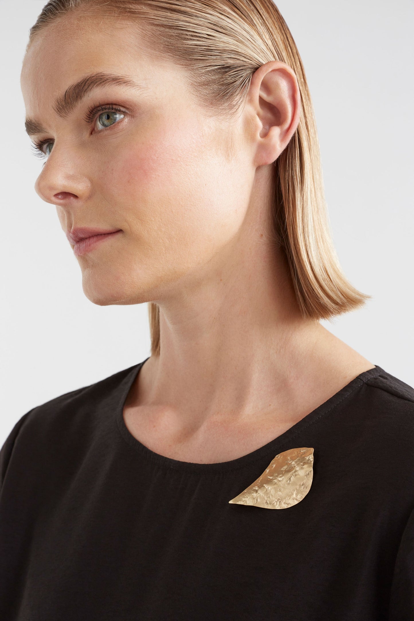 Textured Brass Hammered Bird Brooch Front Model | GOLD