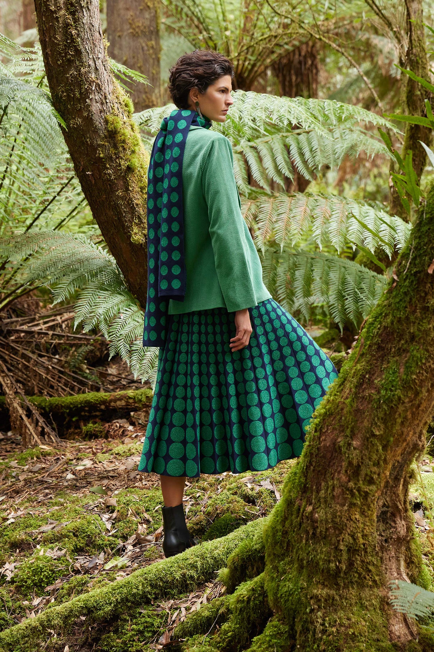 Leira A-Line Midi Metallic Knit Skirt with Circle Design Model Campaign | NAVY GREEN METALLIC