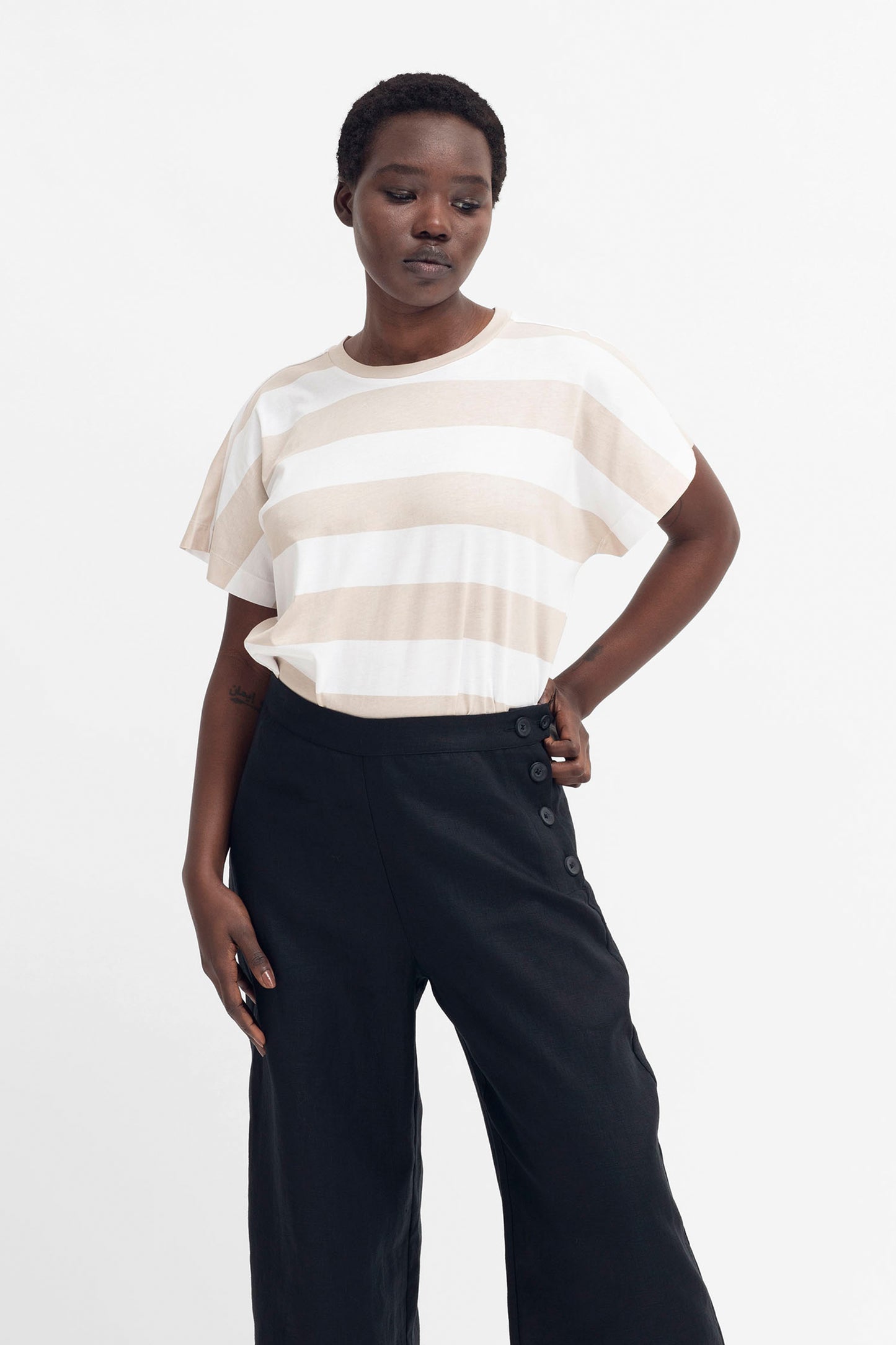 Maika Organic Cotton Stripe T-shirt Model Front Tucked | WHITE ECRU STRIPE