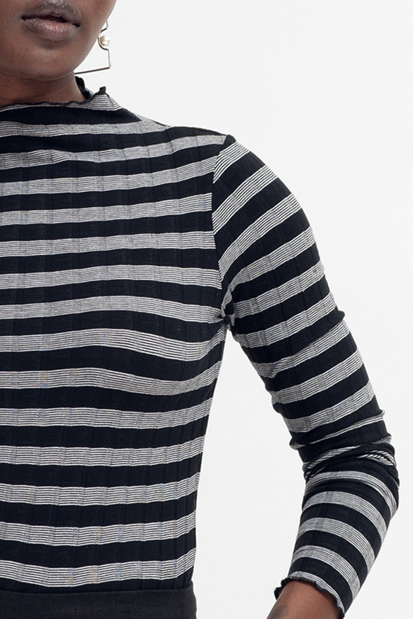 Skiva Striped Organic Cotton Long Sleeve Jersey Turtleneck Top Model Front Detail | BLACK WHITE STRIPE