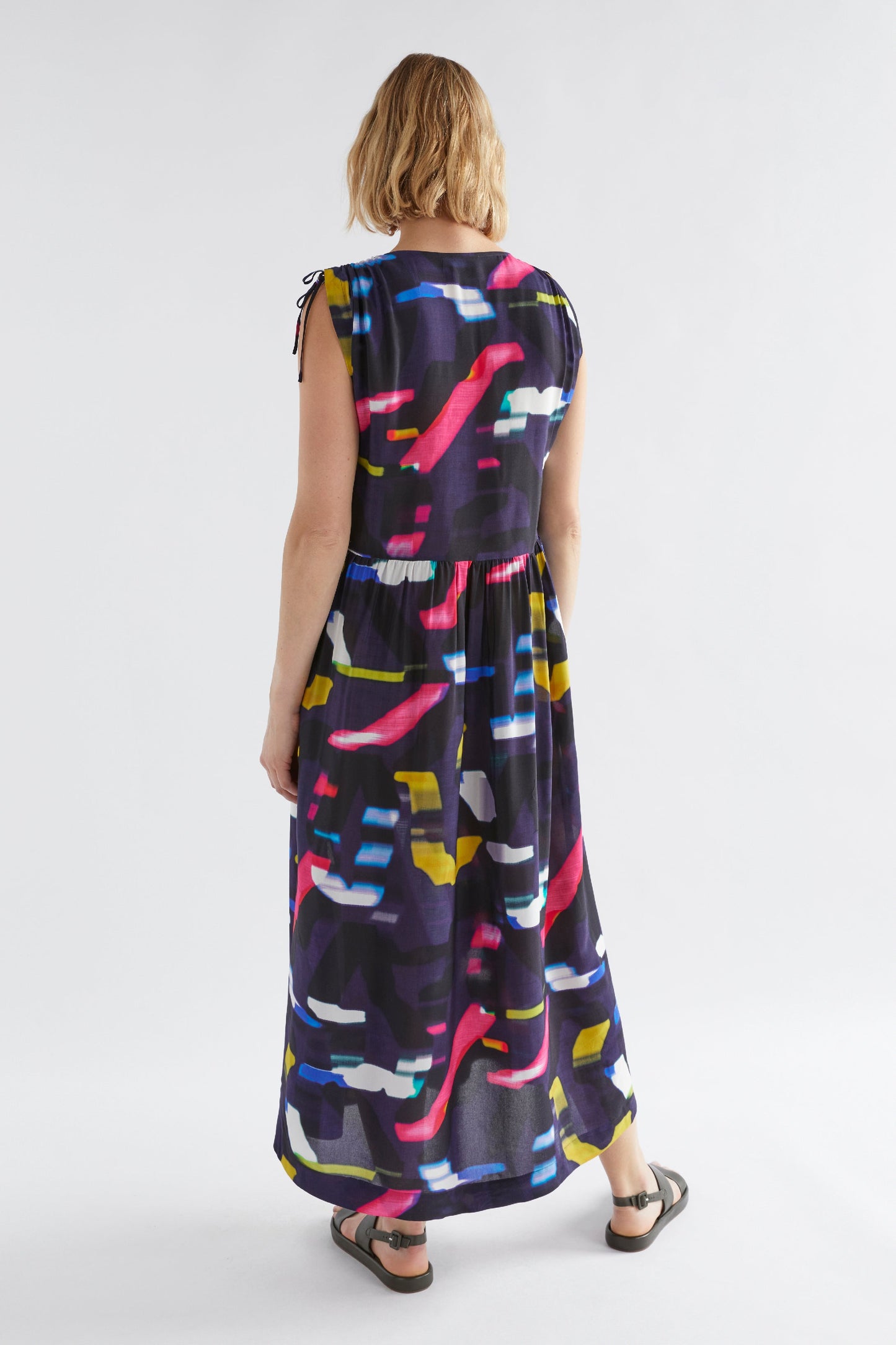 Sid V-Neck Gathered Shoulder Detail Long Print Dress Model Angled Back Jess  | NAVY WEVEN PRINT