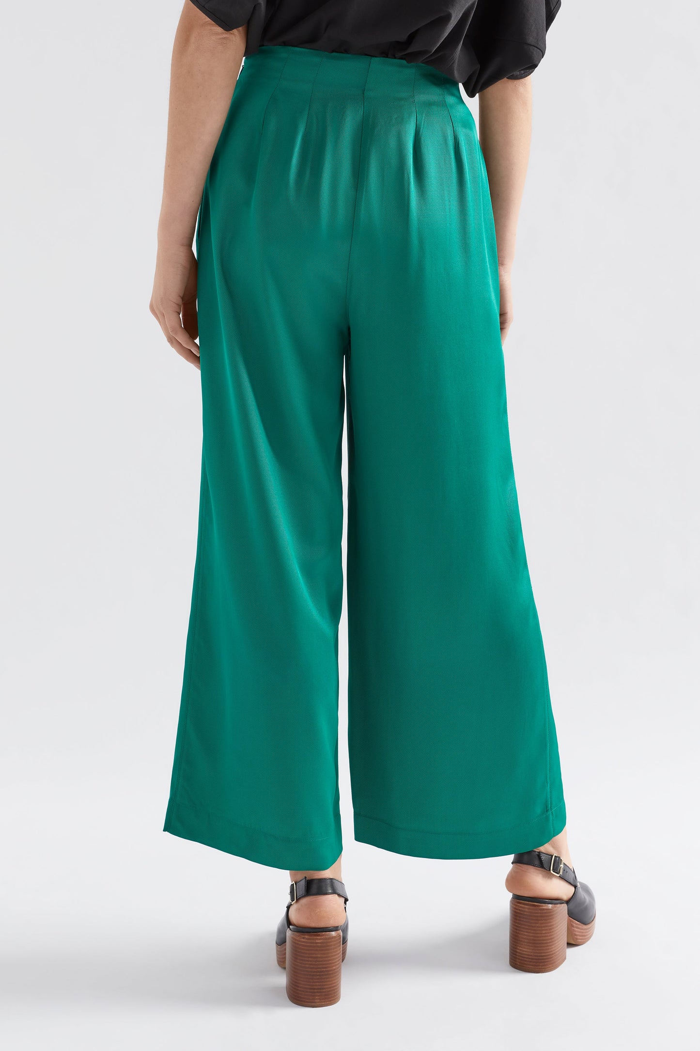 Vail High Waisted Wide Leg Pant Model Back with Black Nid Tee | JEWEL GREEN