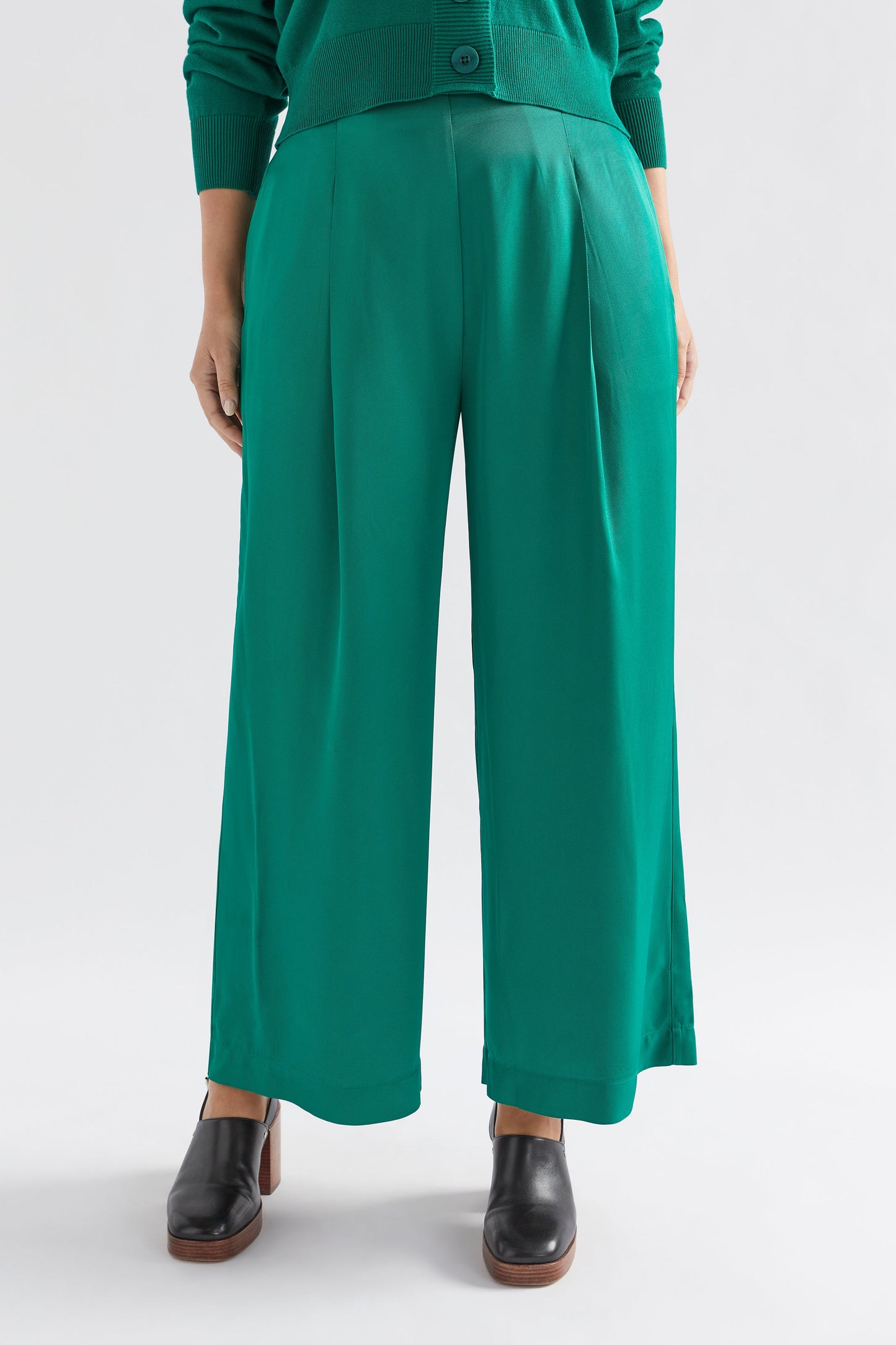 Vail High Waisted Wide Leg Pant Model Front with Cardigan crop | JEWEL GREEN
