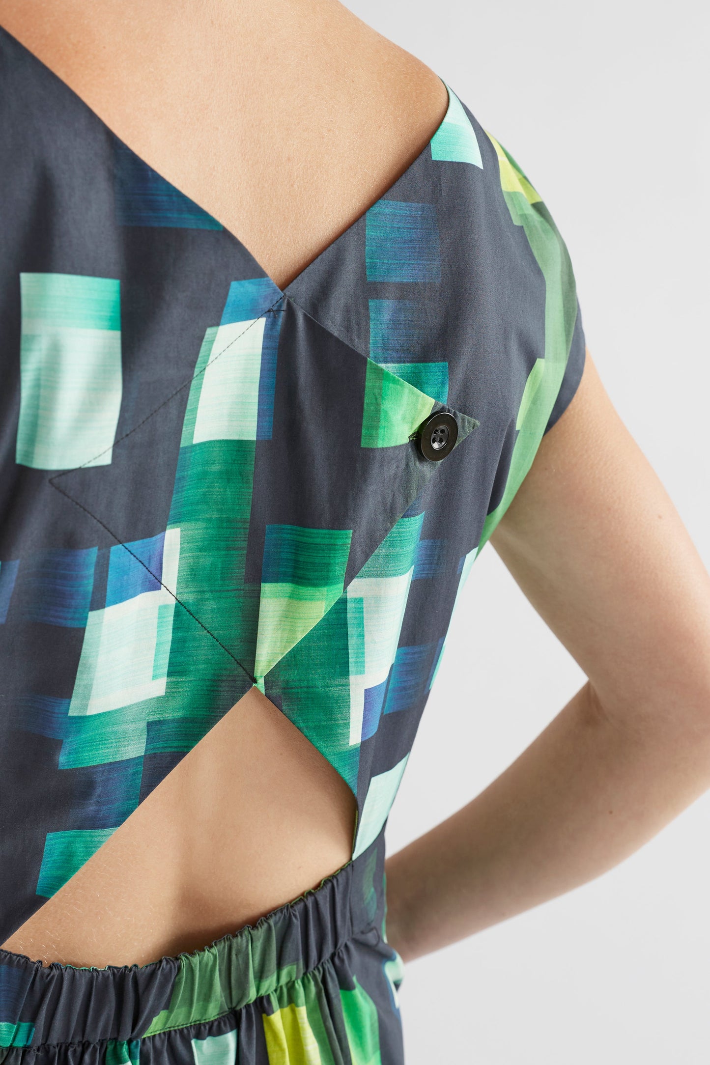 Indi Cap Sleeve Waisted Midi Dress Model Back Detail | GREEN SHUTTER GRID
